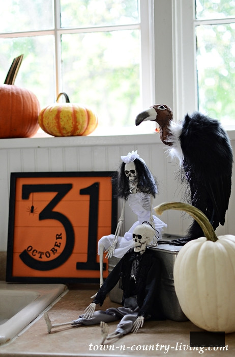 Halloween Vignette with Skeletons and Vulture