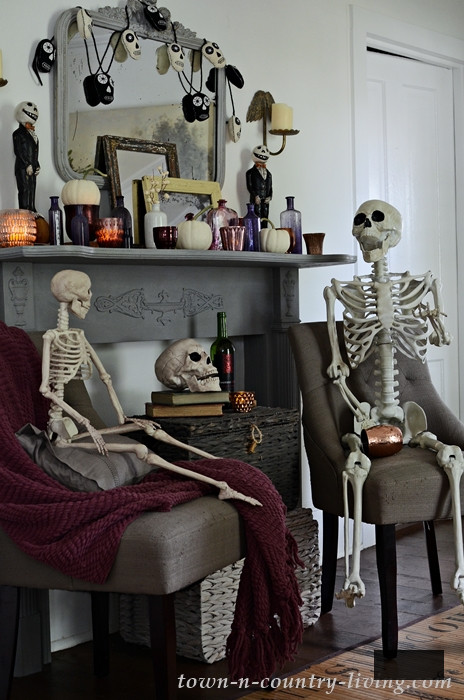 Halloween Decor with Skeletons and Decorated Mantel