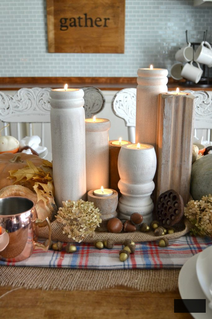 The autumn season is abundant with gatherings for family and friends, and this simple fall tablescape was achievable with a burlap table runner, some plaid fabric, and natural components. Click to find out how to arrange this table in your residence.