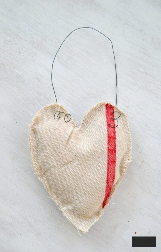 Are you looking for Valentine's Day Decorations? Click over to see how easy it is to make Valentine's Day Decorations from a drop cloth and some other simple supplies.