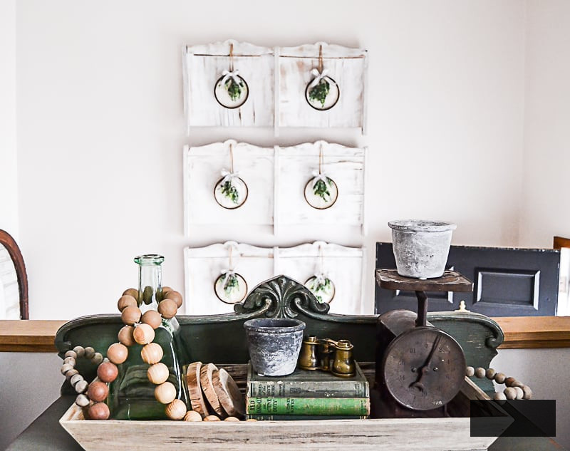 Are you looking for an easy way to create a spring wreath? Click over to see how easy it is to make with embroidery hoops and old book pages!
