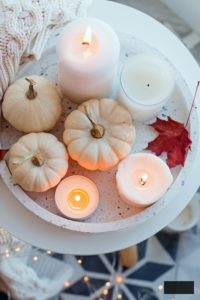 Candle and white gourd centerpiece