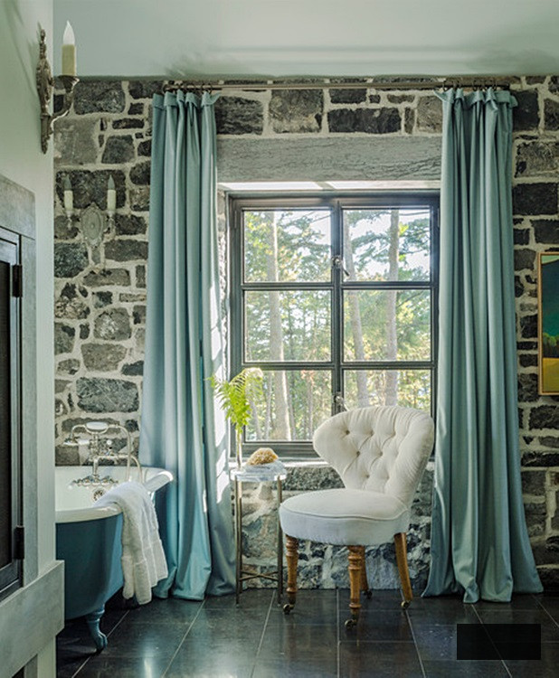 Claw Foot Tub in Historic Stone Farmhouse Bathroom