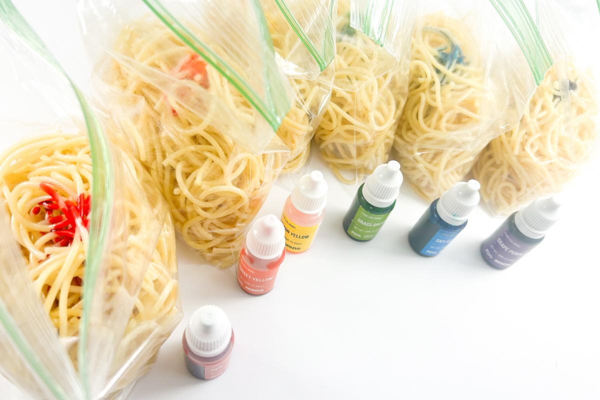 Spaghetti in zipped sandwich bags with liquid food colouring