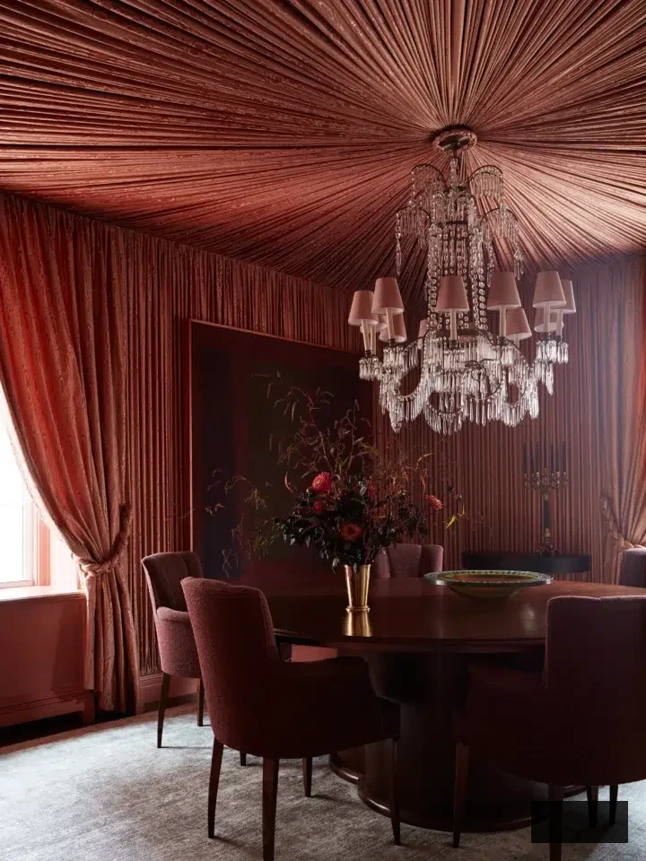 luxurious rust red monochromatic dining area