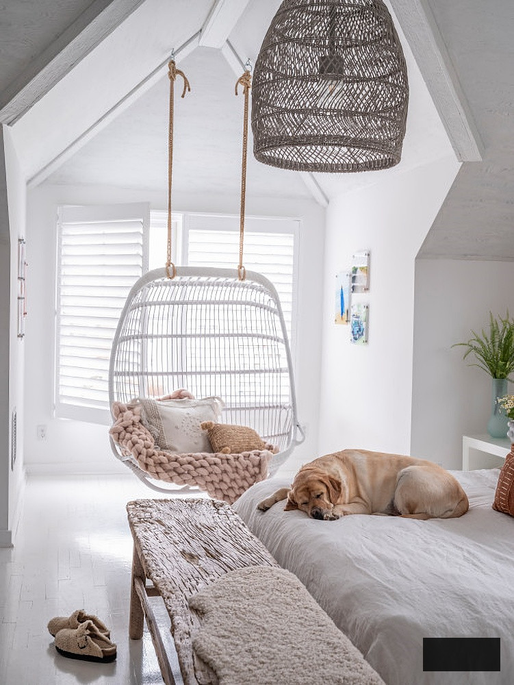 coastal style bedroom with neutral linen bedding