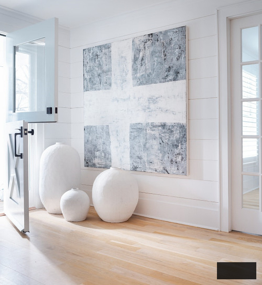 Blue and white entrance with notable artwork