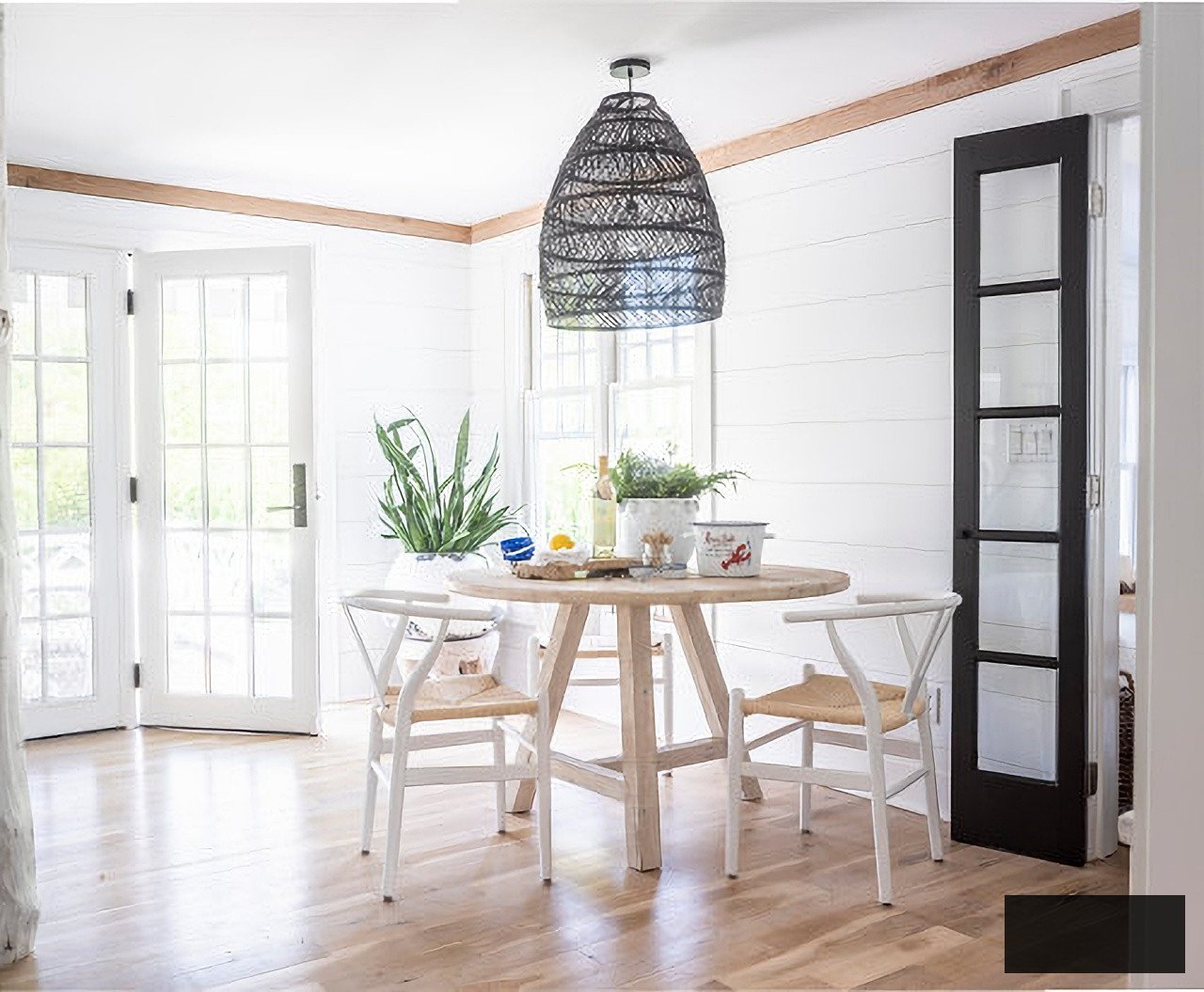 Bright and airy modern coastal dining area