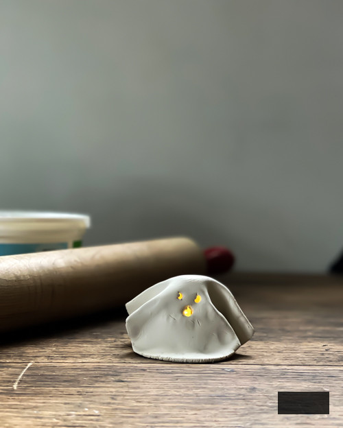 Craft charming DIY Clay Tea Light Ghosts for Halloween! Simple to create, eerie decor that illuminates with battery-powered lights. Ideal handmade accent for your home!