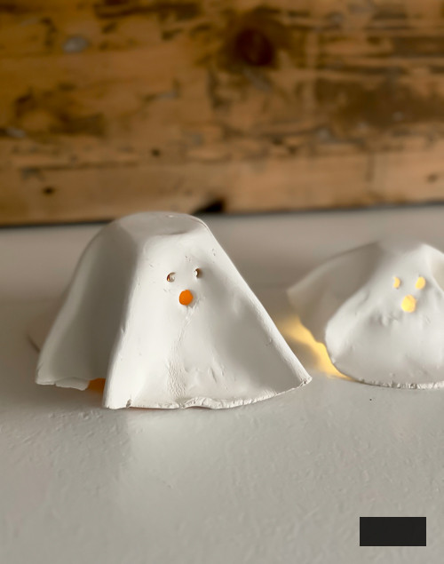 Craft charming DIY Clay Tea Light Ghosts for Halloween! Simple to create, eerie decor that illuminates with battery-powered lights. Ideal handmade accent for your home!