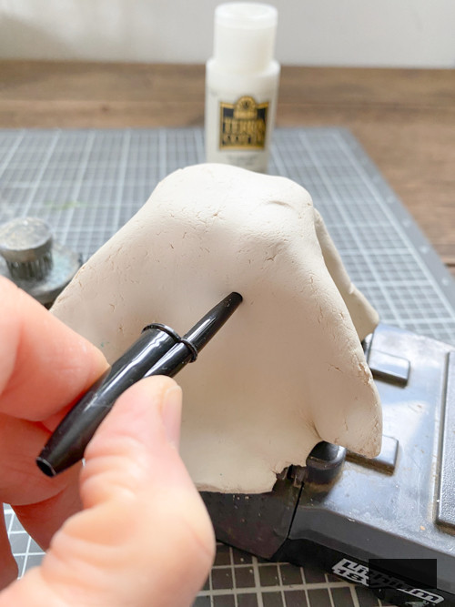 Create adorable DIY Clay Tea Light Ghosts for Halloween! Easy-to-make, spooky decor that glows with battery-operated lights. Perfect handmade charm for home!
