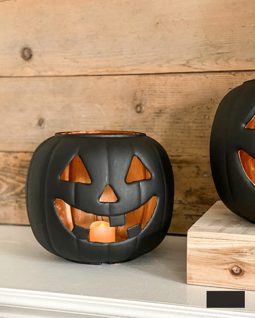 Craft chic Halloween decor with DIY Pottery Barn Jack-O-Lantern replica. Achieve the upscale appearance for under $5 using plastic buckets, paint, and LED lights.