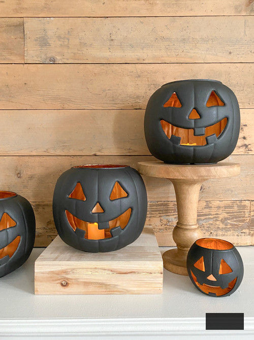 Craft chic Halloween decor with DIY Pottery Barn Jack-O-Lantern replica. Achieve the upscale appearance for under $5 using plastic buckets, paint, and LED lights.