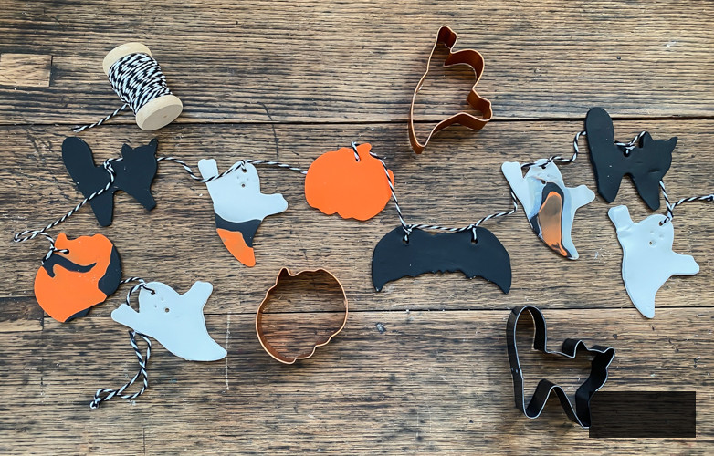 Create a spooky DIY Halloween Clay Garland with our easy step-by-step guide. Perfect for adding a handmade touch to your Halloween decorations this season!