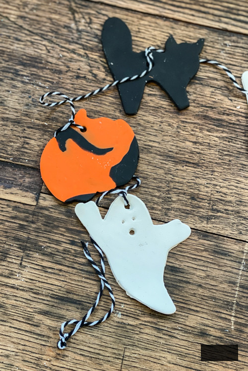 Craft a spooky DIY Halloween Clay Garland with our simple step-by-step tutorial. Ideal for enhancing your Halloween decorations with a personal touch this season!