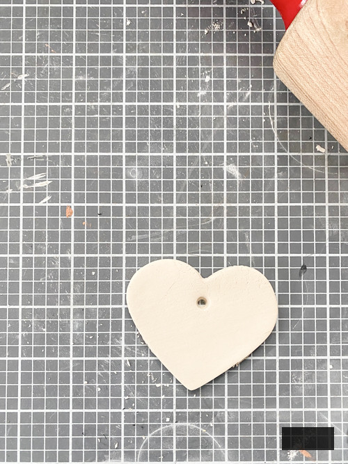 Create a charming DIY Heart Garland using air dry clay, book pages, and stain. This easy craft adds a vintage touch to your home decor for any season.