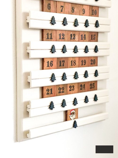 Transform a thrift store find into a festive DIY thrifted advent calendar! This budget-friendly upcycling project is perfect for a creative Christmas countdown.