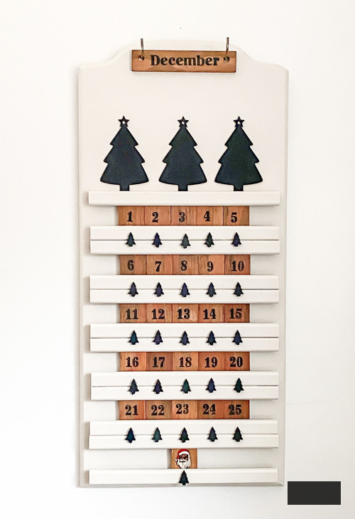 Transform a thrift store find into a festive DIY thrifted advent calendar! This budget-friendly upcycling project is perfect for a creative Christmas countdown.