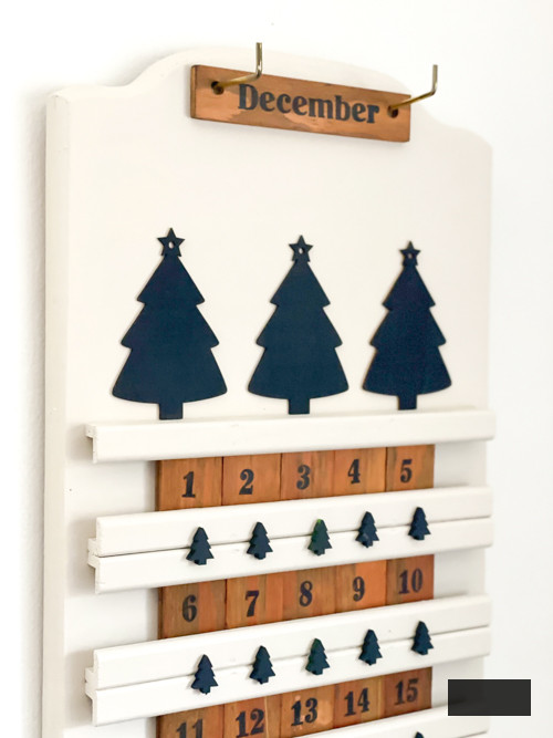 Transform a thrift store find into a festive DIY thrifted advent calendar! This budget-friendly upcycling project is perfect for a creative Christmas countdown.