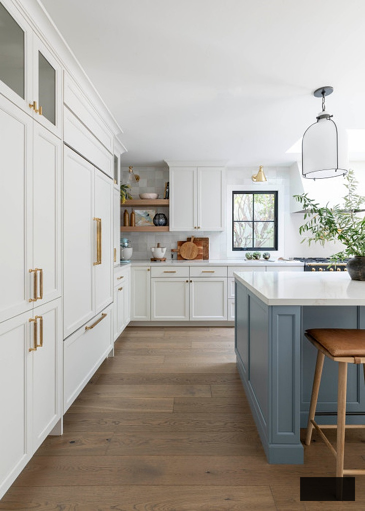 blue and white kitchen with wood floor