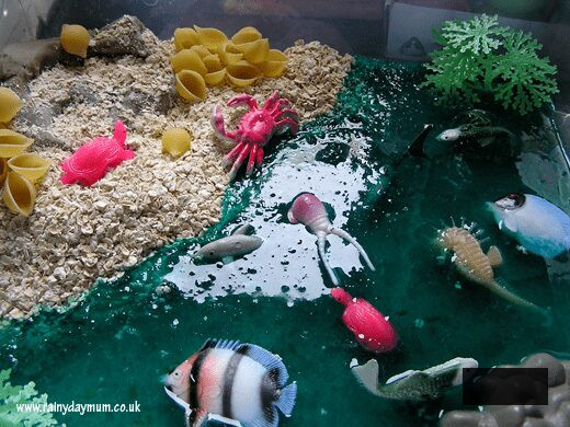 simple ocean sensory bin set up with taste safe materials