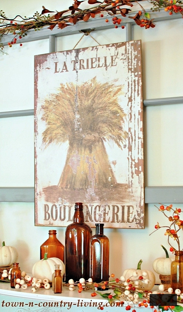 vintage autumn mantel with flea market finds