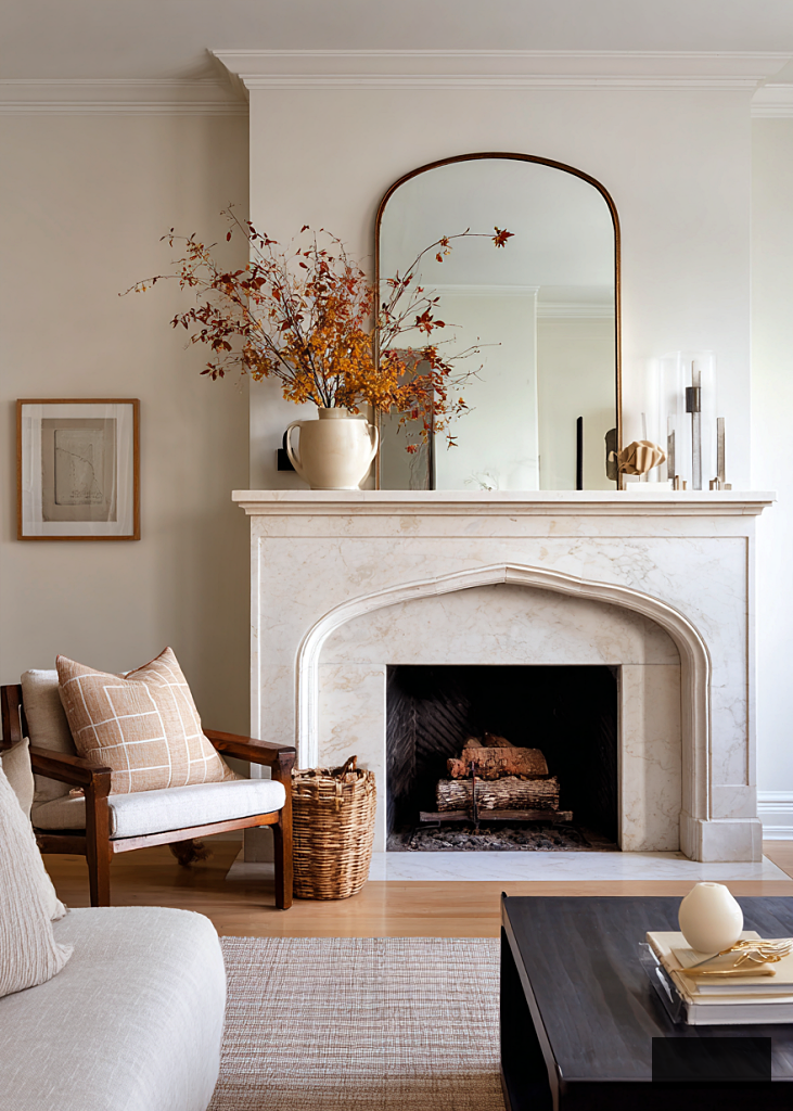 beautiful marble fireplace with vintage mirror