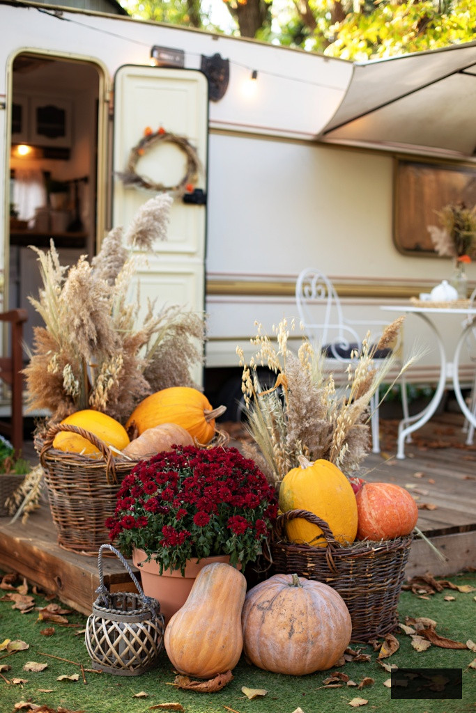 RV Camper with Deck Decorated for the Fall Season