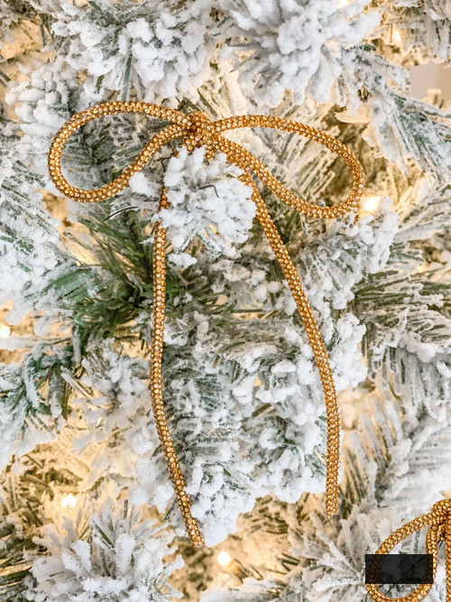 DIY Rhinestone Bow Christmas Ornaments bring glimmer and flair to your holiday décor. Simple, economical, and ideal for this year’s fashionable bow trend!