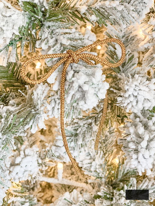 DIY Rhinestone Bow Christmas Ornaments bring glimmer and flair to your holiday décor. Simple, economical, and ideal for this year’s fashionable bow trend!