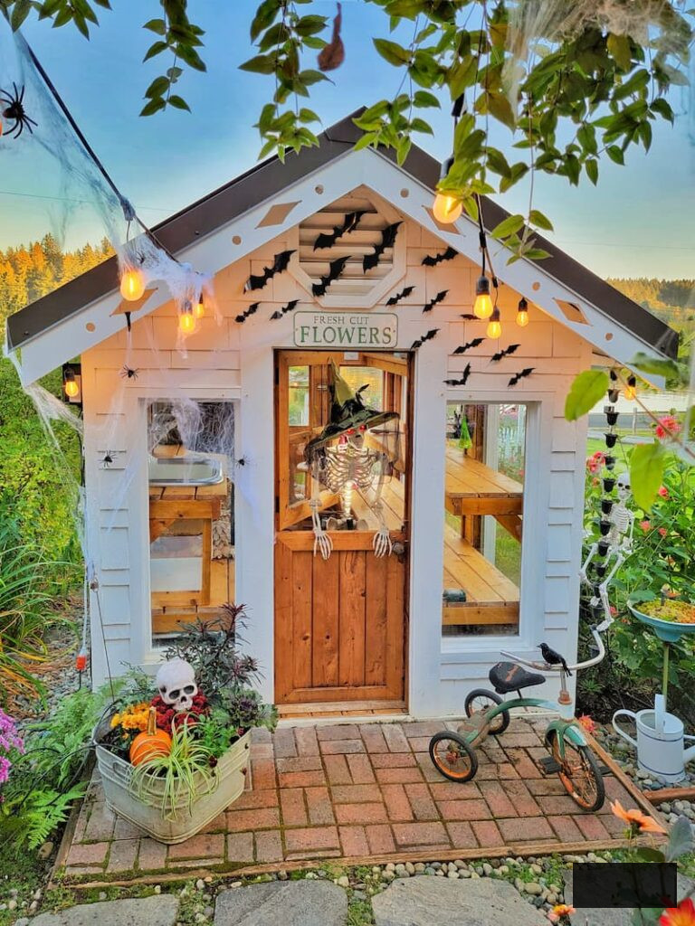 greenhouse porch adorned for Halloween
