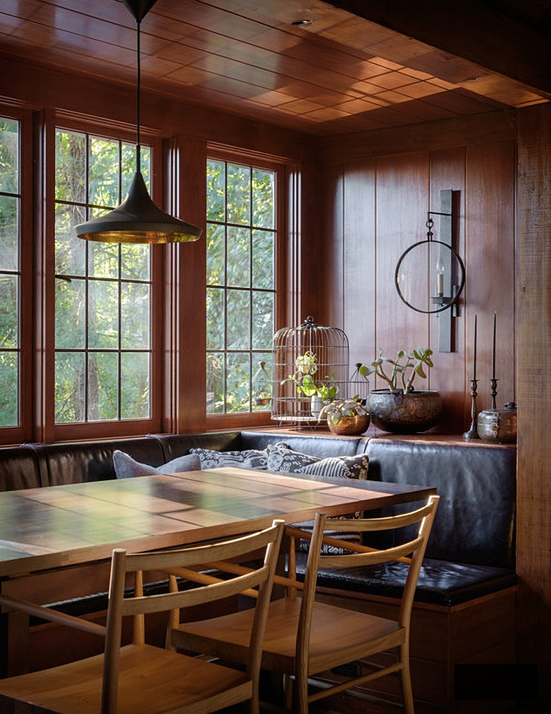 cozy dining nook with wood paneling