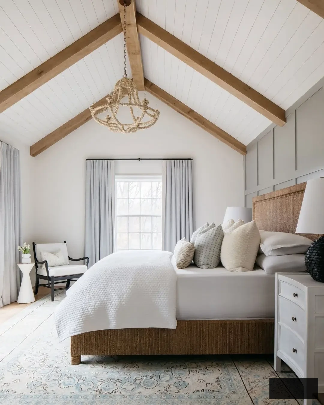 gray attic bedroom concept with gray accent wall 