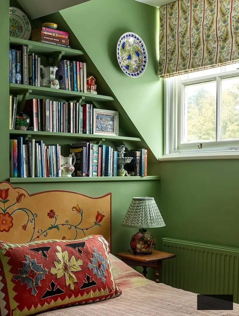 green cottage attic bedroom design with hand painted headboard