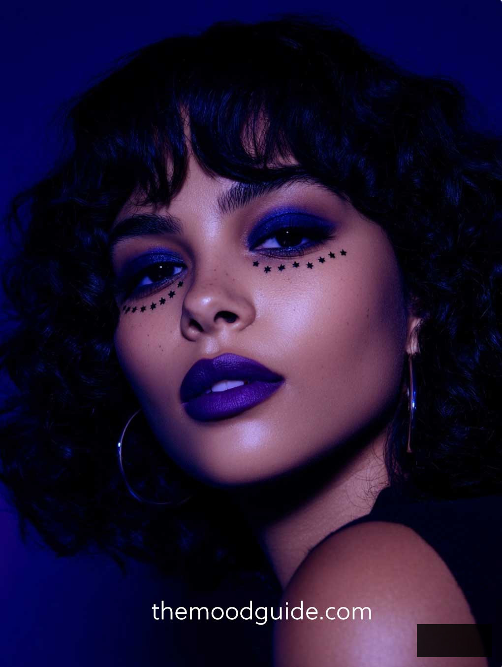 elegant dark blue and purple celestial makeup for halloween