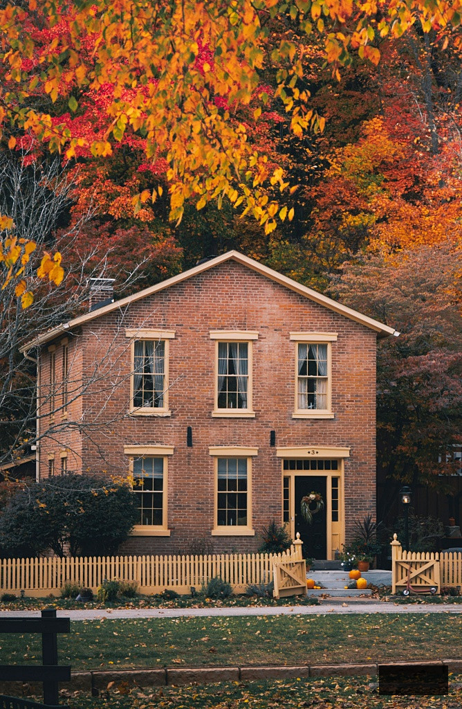 brick home in fall season