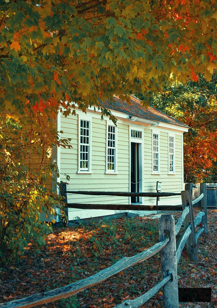 House with beautiful Fall colors in New England in USA