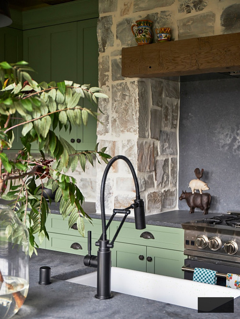 rustic kitchen with green country cabinets