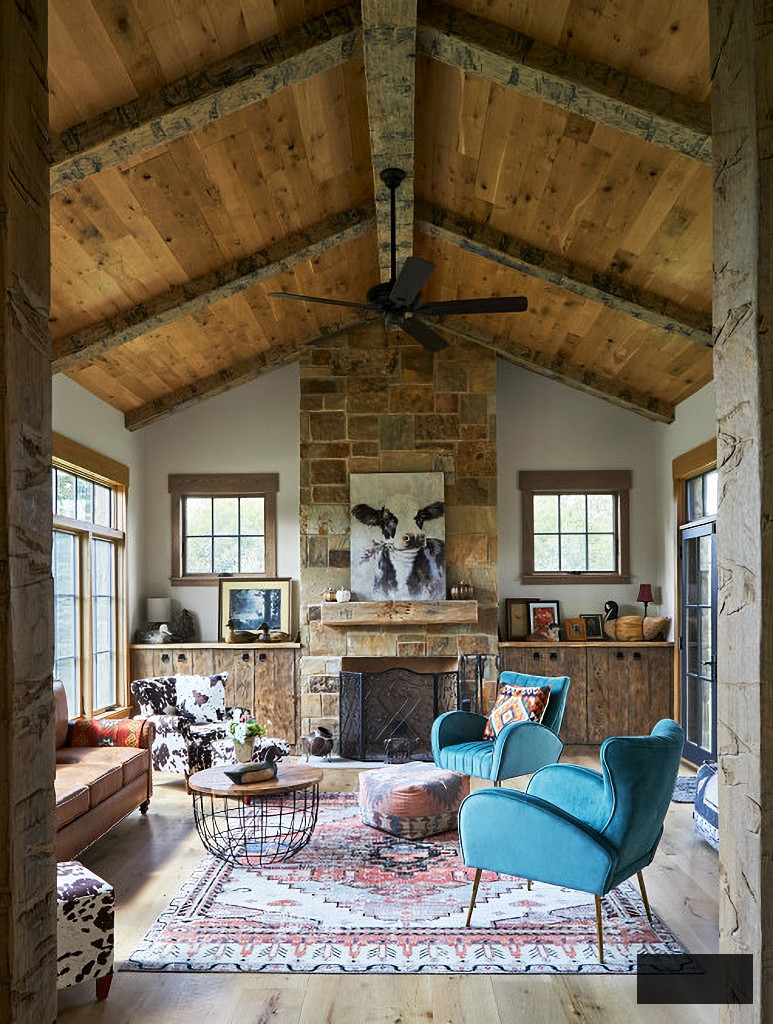 rustic family room with stone fireplace