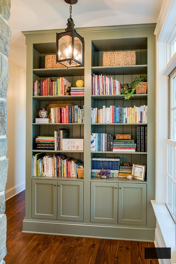 sage green built-in bookcase