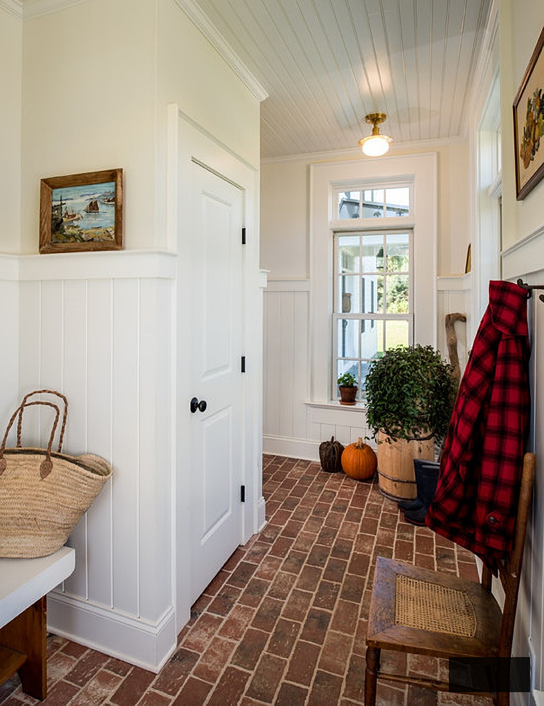 brick flooring in farmhouse mudroom
