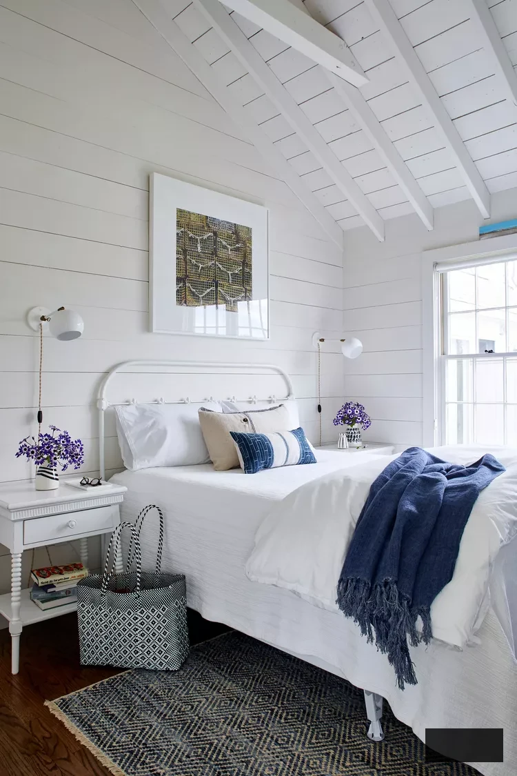 White Coastal Attic Bedroom with Shiplap