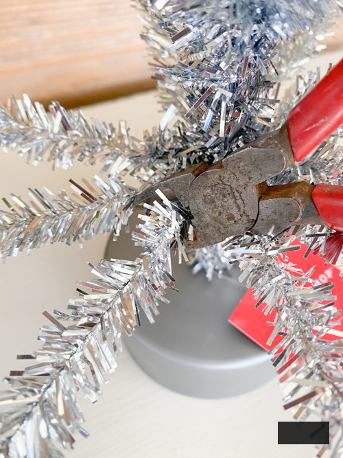 Learn how to create a DIY Vintage Aluminum Christmas Tree with cost-efficient materials. A delightful retro endeavor to infuse sparkle and vintage allure into your holiday season.