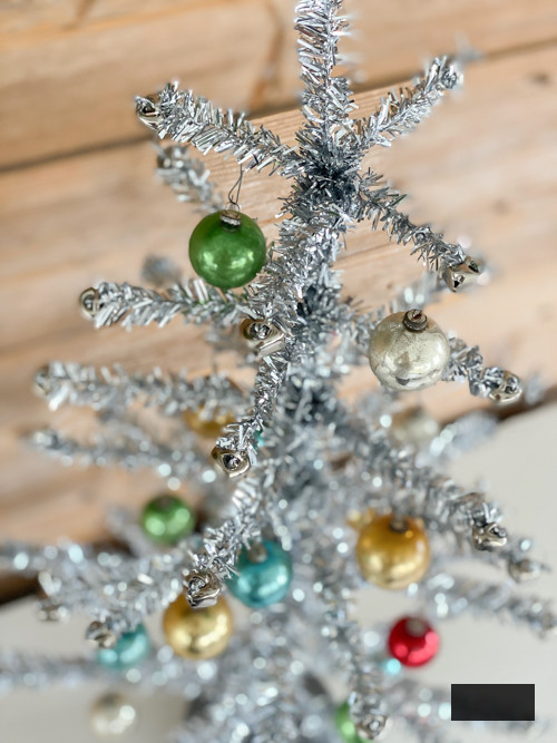 Learn how to create a DIY Vintage Aluminum Christmas Tree with cost-efficient materials. A delightful retro endeavor to infuse sparkle and vintage allure into your holiday season.