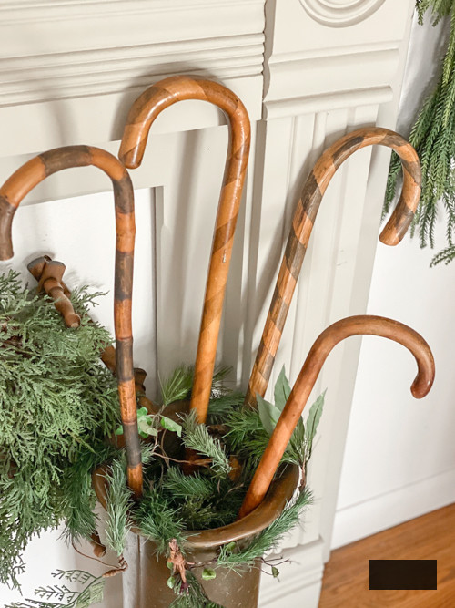 Transform old wooden canes into beautiful Christmas decor with this DIY Wooden Candy Canes tutorial. Simple, budget-friendly, and perfect for holiday decor.