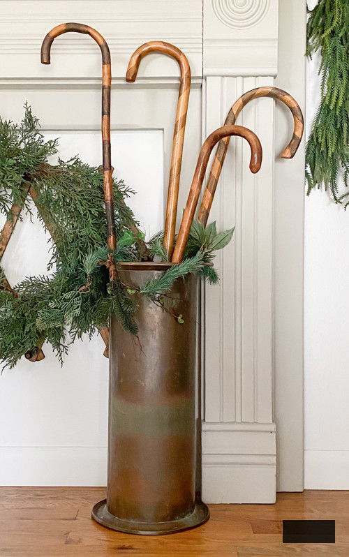 Transform old wooden canes into beautiful Christmas decor with this DIY Wooden Candy Canes tutorial. Simple, budget-friendly, and perfect for holiday decor.