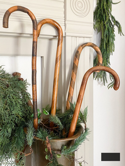 Transform old wooden canes into beautiful Christmas decor with this DIY Wooden Candy Canes tutorial. Simple, budget-friendly, and perfect for holiday decor.