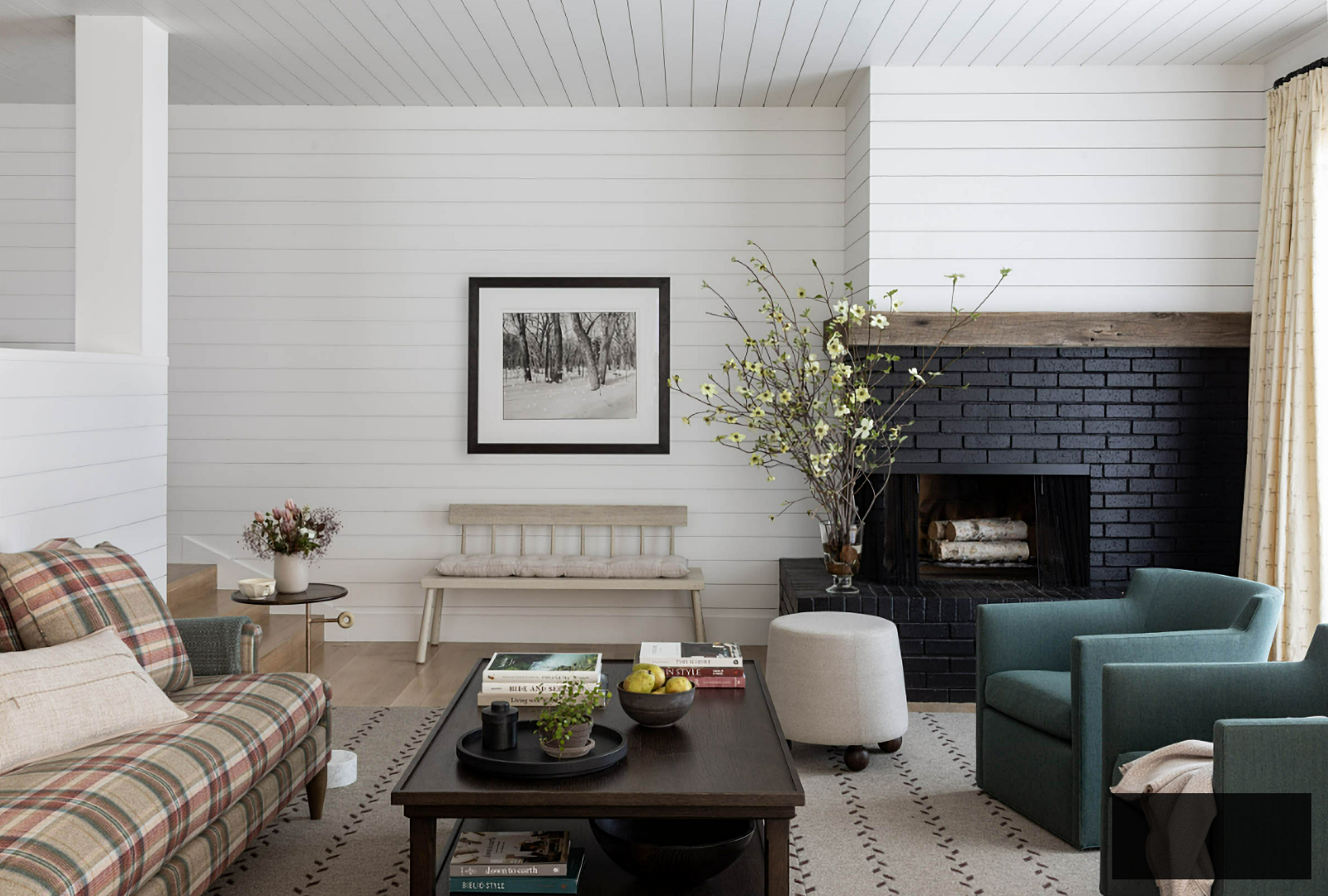 country living room with black corner fireplace