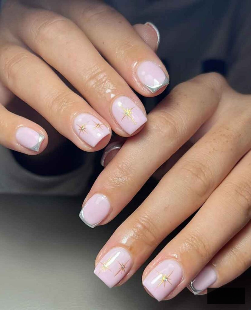 soft pink and gold holiday nails