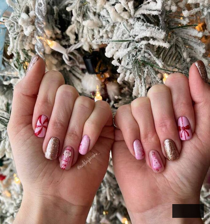 rose, crimson, and sparkling gold nails